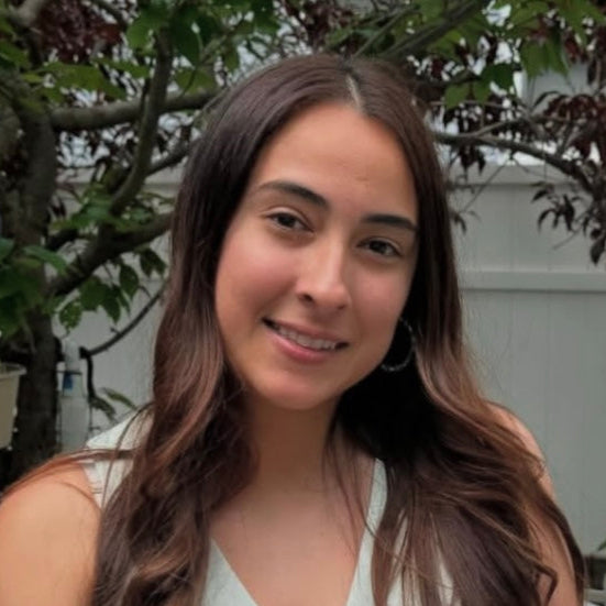 Diana Umana holding a birthday cake