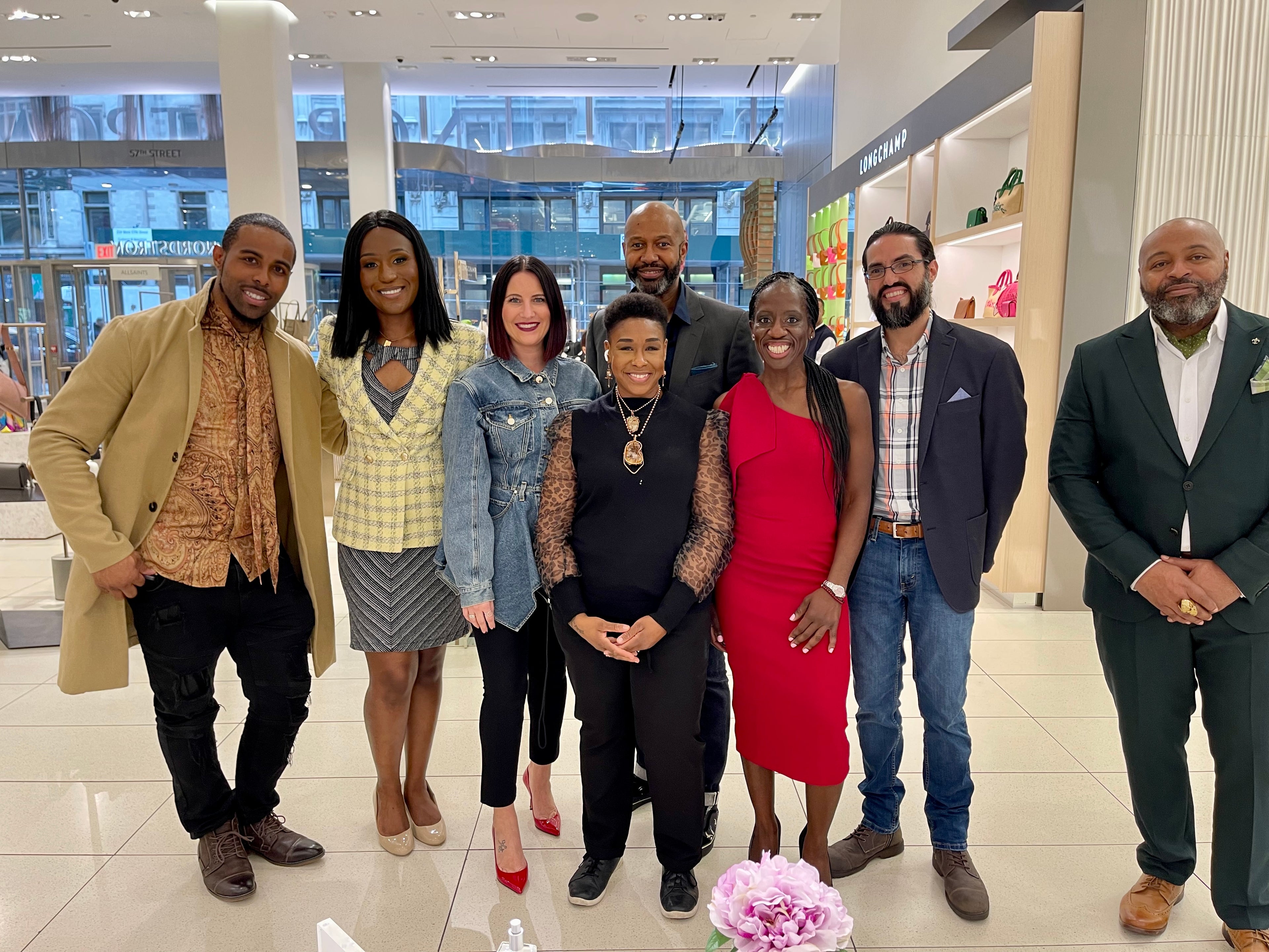 Finda Kpakiwa with fragrance owners and store executives in Nordstrom's NYC flagship store